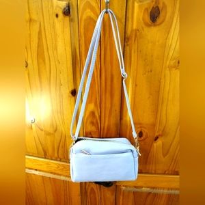 Fashion Puzzle women's crossbody purse, purple.